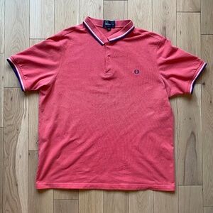 Fred Perry
Orange Polo
Size XXL - Slim Fit
Pre-Owned / Good condition